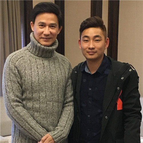 李子雄與經(jīng)紀(jì)人李志合影